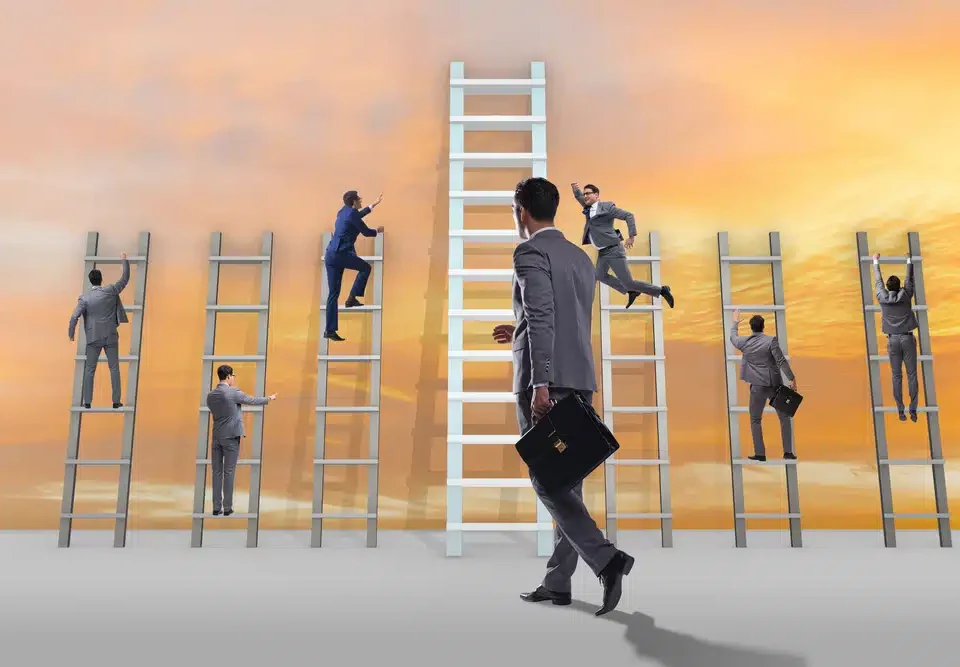 A group of businessmen standing on ladders at sunset.